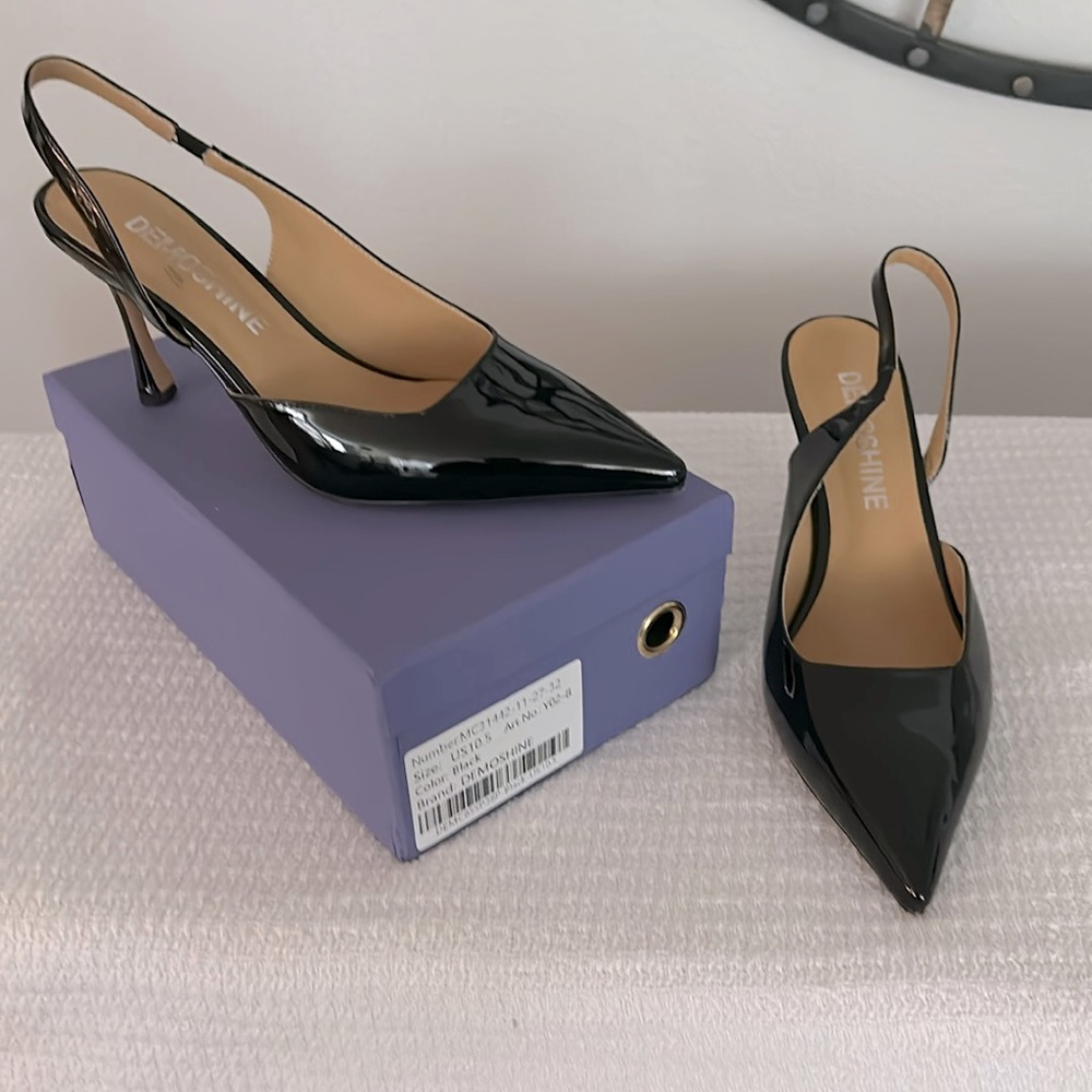 Dress shoes heel height 4 inch. Size 10 Black patent leather.